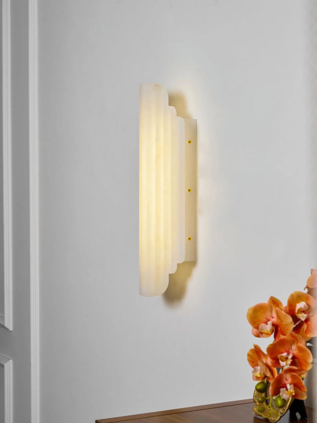 Modern Alabaster Art Glass Wall Sconce Mounted on White Wall