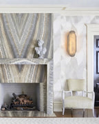 Modern Tiered Alabaster Wall Sconce Near Fireplace Mantel