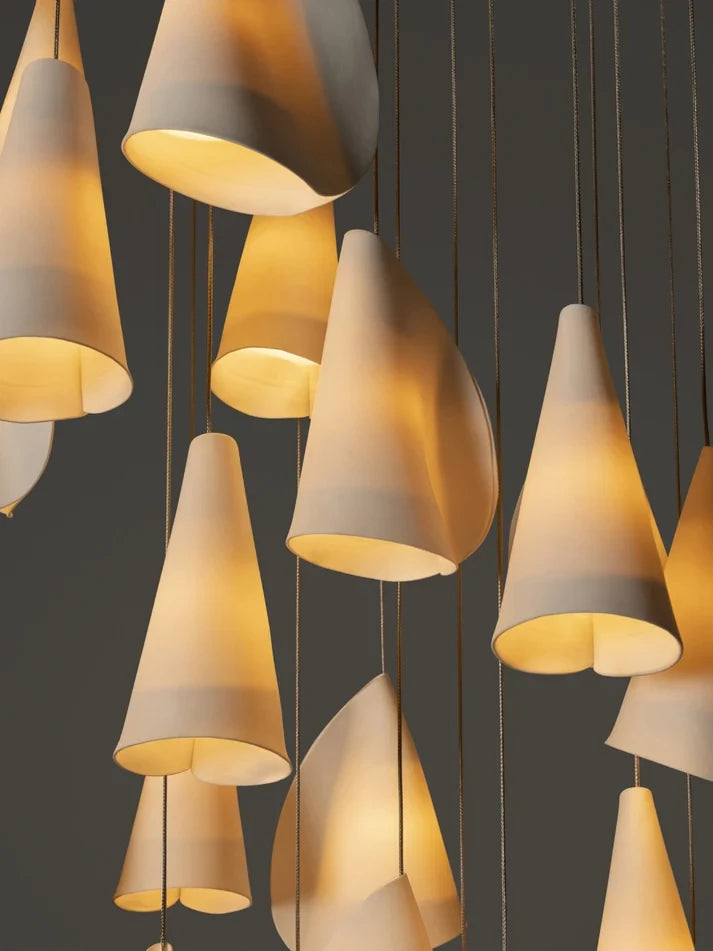 Close Up View of Glowing Porcelain Cones and Cable Suspension