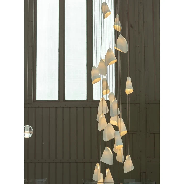 Cascading Porcelain Cone Chandelier Near Arch Window