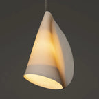 Detail View of Single Curved Porcelain Shade with Internal Light