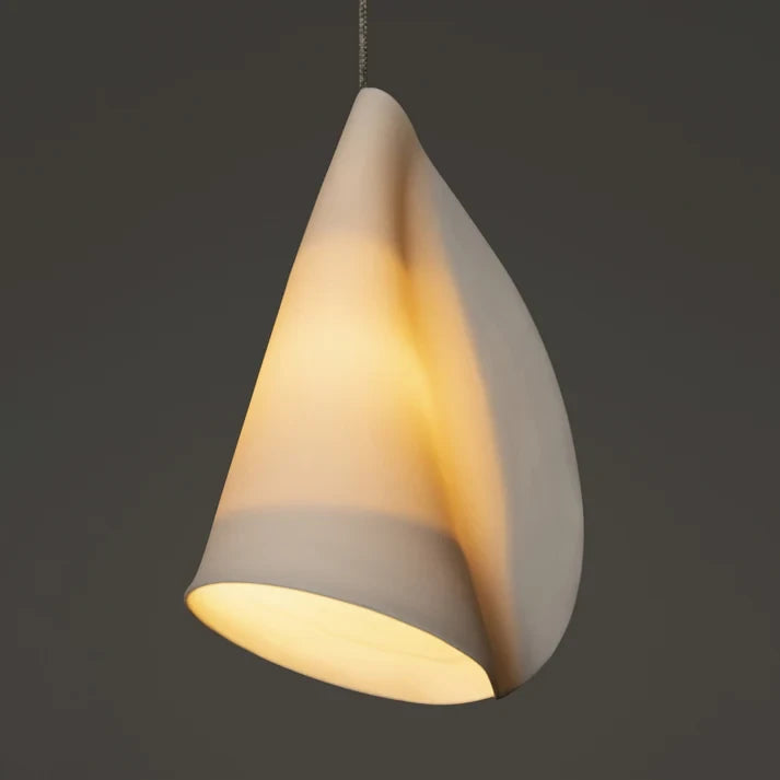 Detail View of Single Curved Porcelain Shade with Internal Light