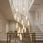 Large Alabaster Cylinder Waterfall Chandelier Over Staircase