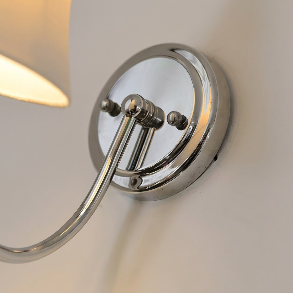 Detail View of Polished Chrome Backplate and Adjustable Swivel Joint