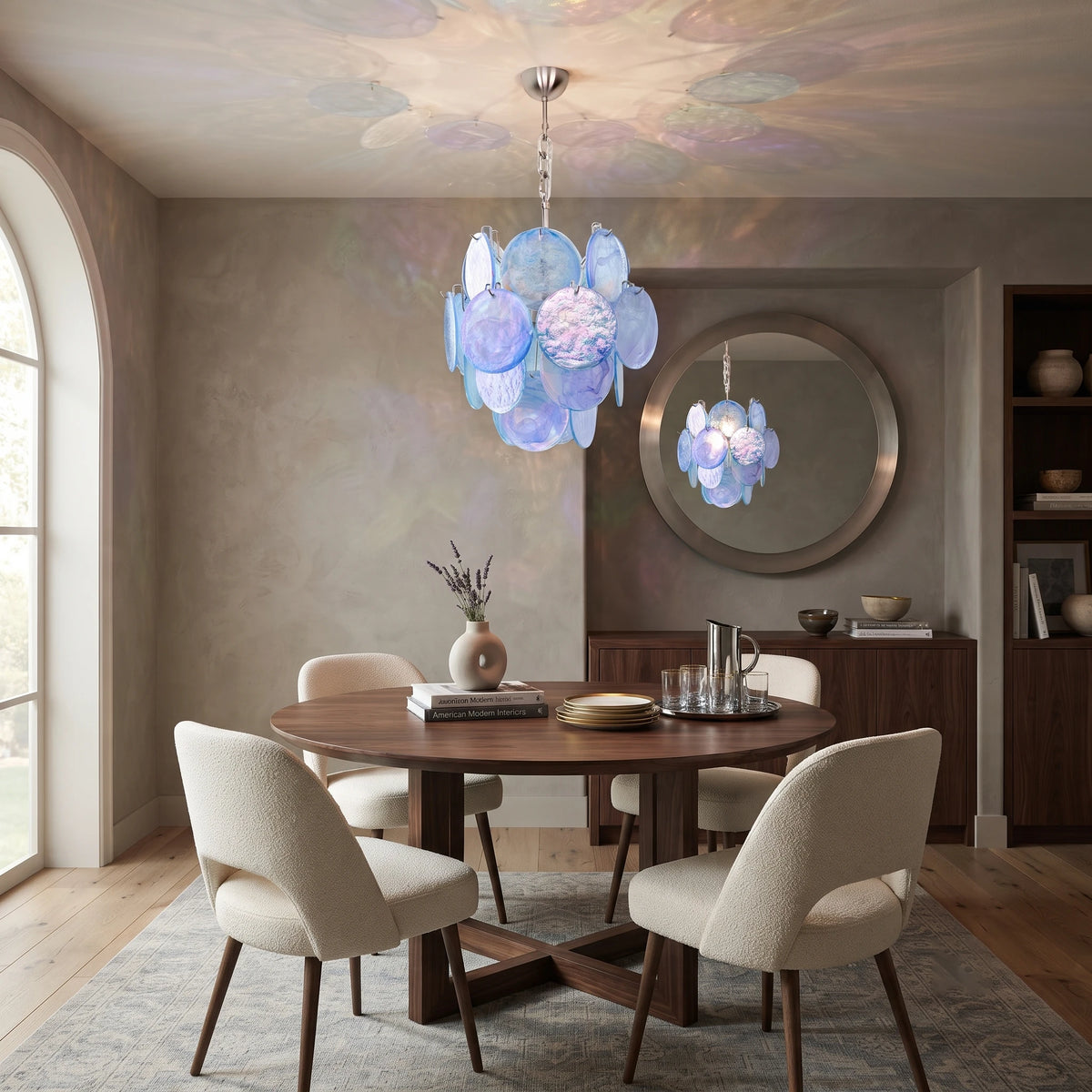 Modern Blue Glass Chandelier Hanging in Bright Dining Room