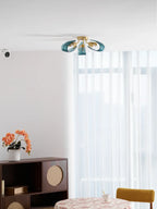 Modern Blue Ribbon Ceiling Light in Sunlit Interior Space