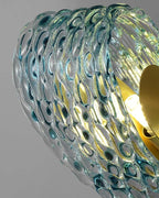 Close Up View of Blue Ribbon Textured Glass Shades and Curved Edges