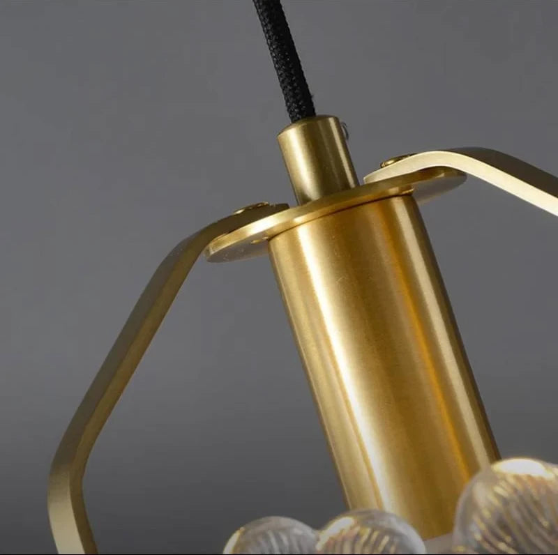 Close Up View of Brass Canopy and Suspension Chain Structure