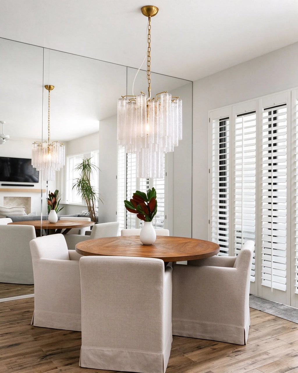 Modern Ice Rod Art Glass Chandelier Over Round Dining Table