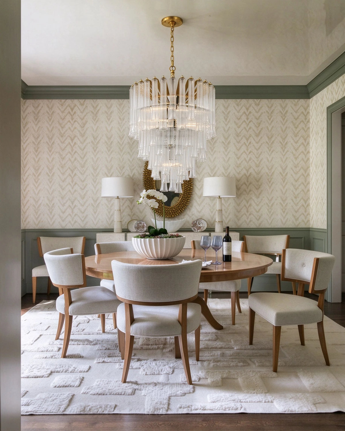 Modern Brass Multi-Tier Chandelier Over Round Dining Table