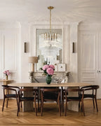 Modern Brass Multi-Tier Chandelier in Elegant Dining Space