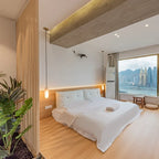 Modern Cylindrical Alabaster Pendant Light in Minimalist Bedroom