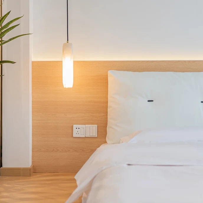 Modern Cylindrical Alabaster Pendant Light Over Bedroom Bedside