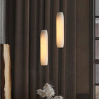 Modern Cylindrical Alabaster Pendant Lights in Living Room Interior