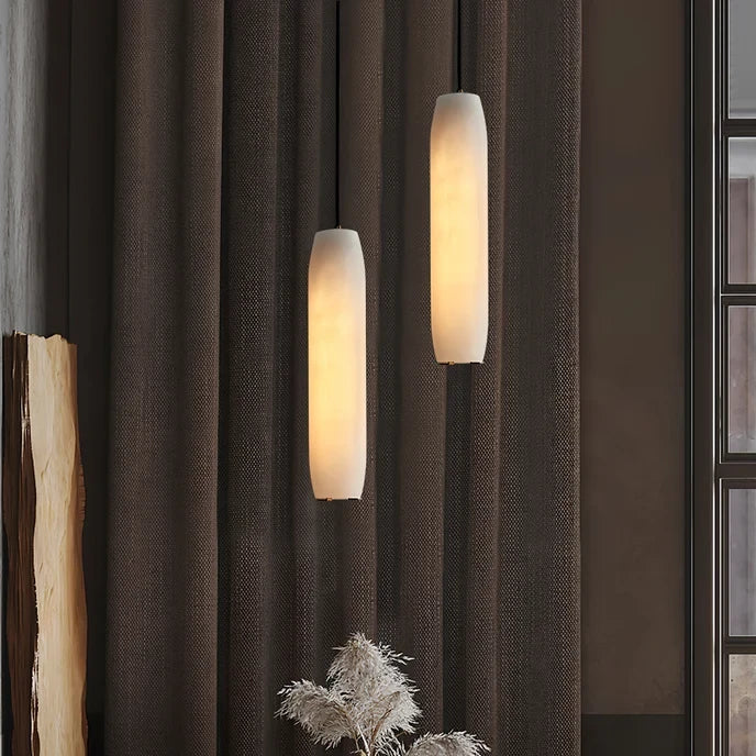 Modern Cylindrical Alabaster Pendant Lights in Living Room Interior
