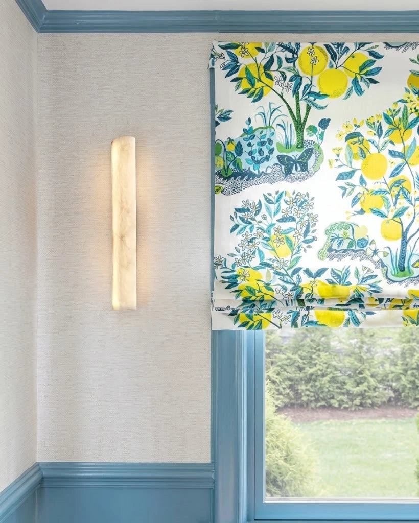 Modern Vertical Cylindrical Alabaster Wall Sconce in Bright Interior