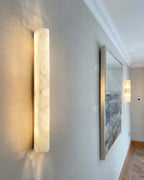 Modern Alabaster Art Glass Wall Sconces Along Hallway Corridor