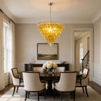 Modern Yellow Faceted Glass Chandelier Over Round Dining Table