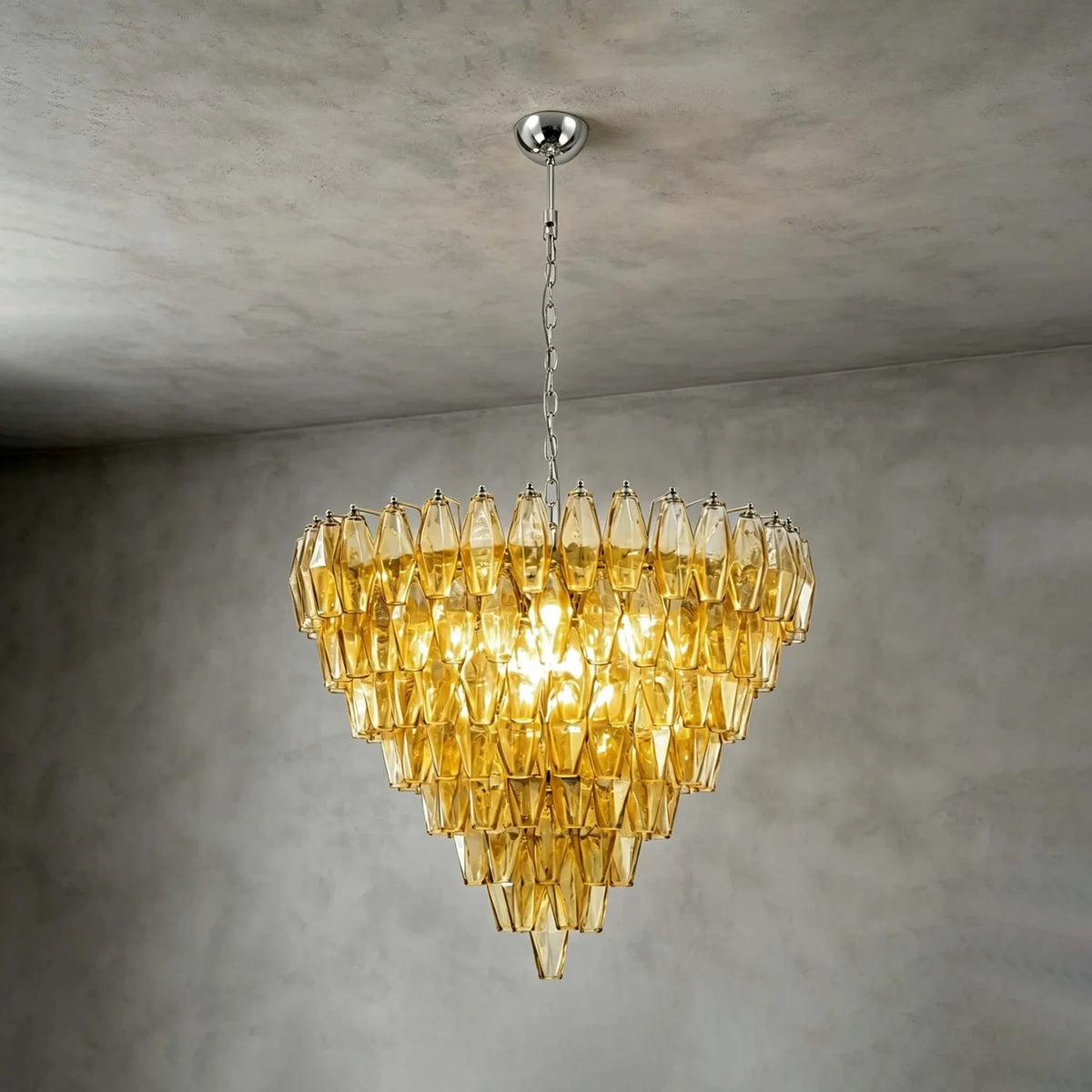 Angled View of Illuminated Modern Yellow Faceted Glass Chandelier