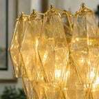 Close Up View of Yellow Faceted Glass Shades and Internal Lighting