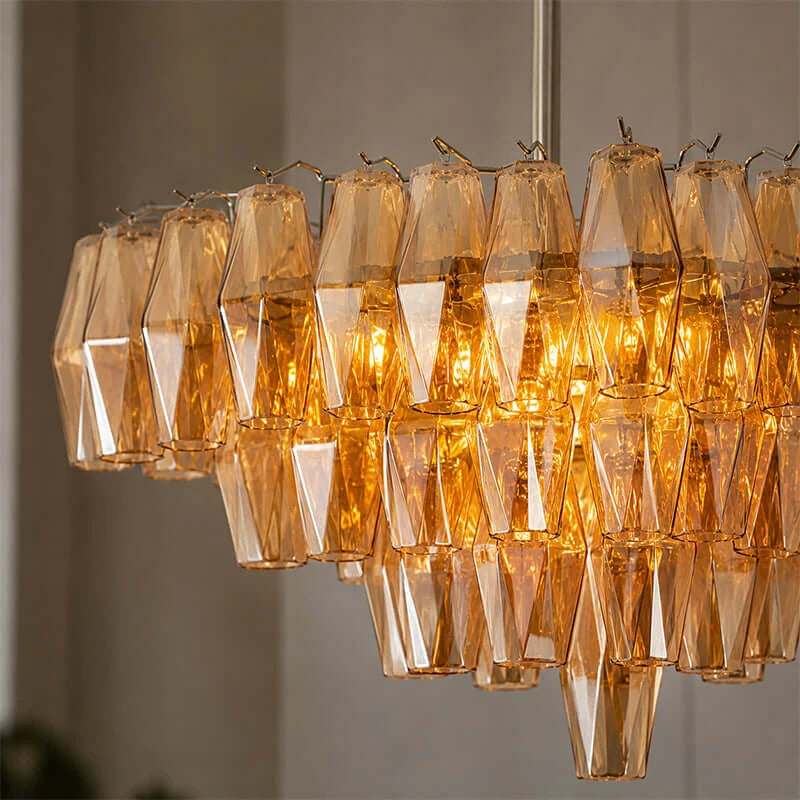 Side View of Illuminated Modern Amber Faceted Glass Chandelier
