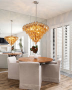 Modern Amber Faceted Glass Chandelier Over Round Dining Table
