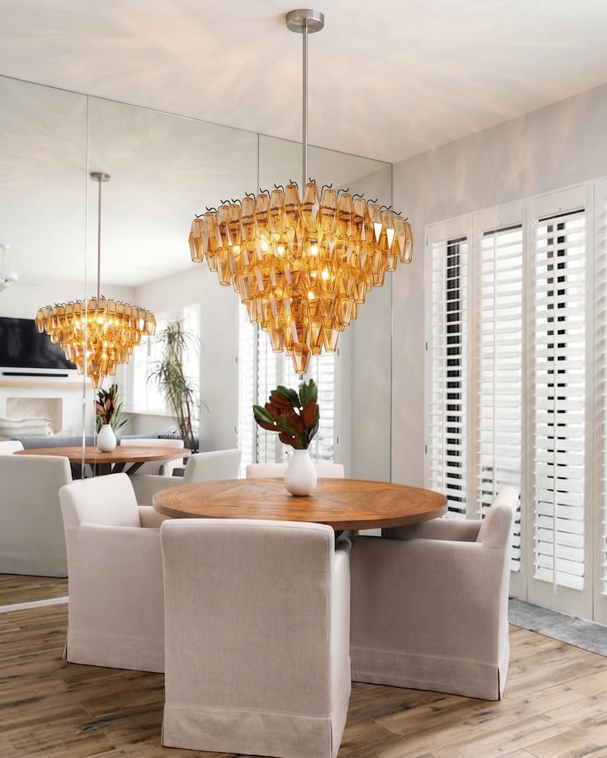 Modern Amber Faceted Glass Chandelier Over Round Dining Table