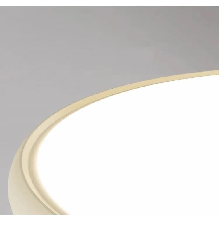 Side View of Illuminated Modern Ultra-Thin Round Ceiling Light