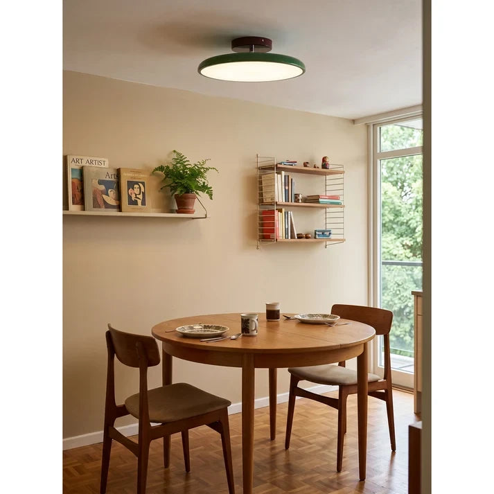 Modern Ultra-Thin Ceiling Light Over Dining Room Table