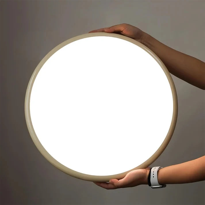 Hand Holding Modern Ultra-Thin Round Flush Mount Ceiling Light