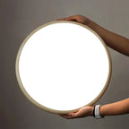 Hand Holding Modern Ultra-Thin Round Flush Mount Ceiling Light