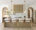 Modern Brass Alabaster Pendant Lights Over Kitchen Island