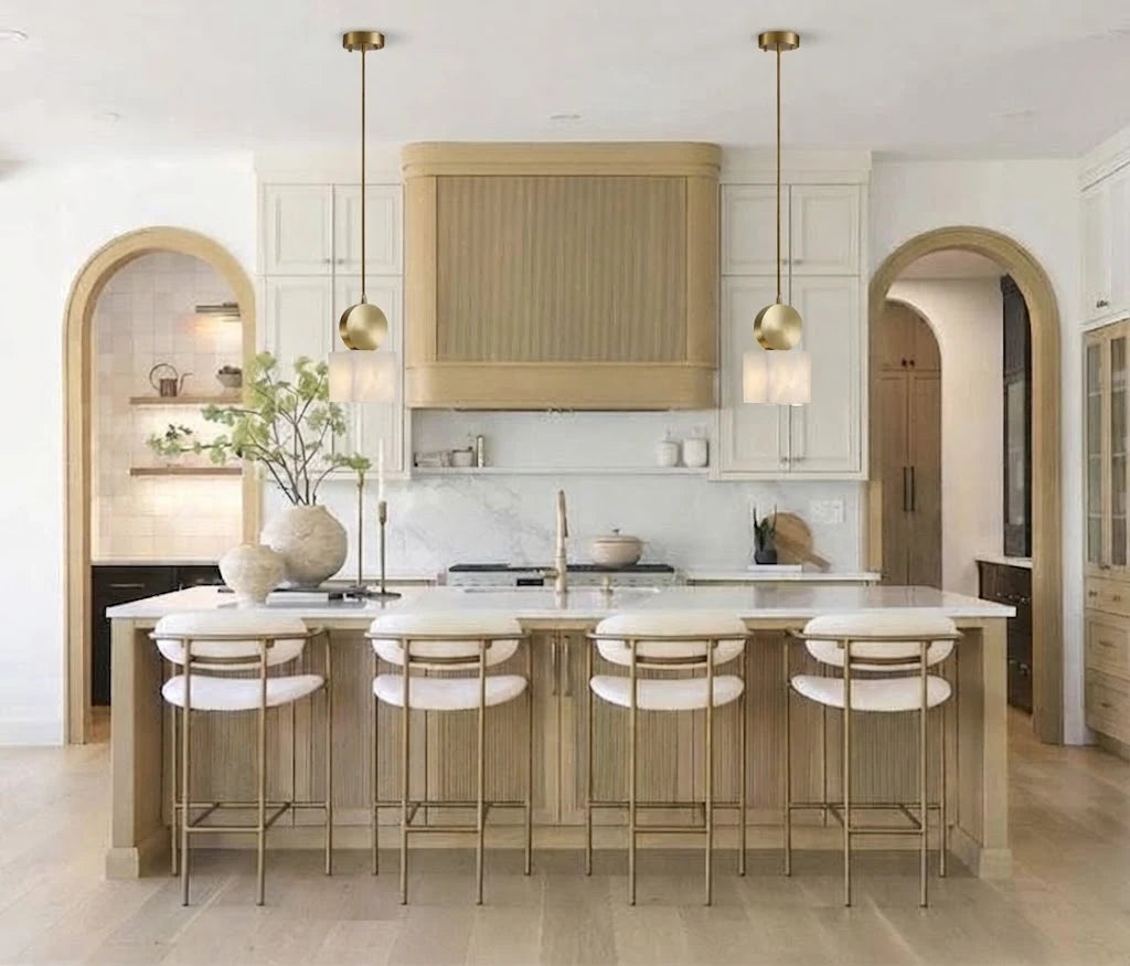 Modern Brass Alabaster Pendant Lights Over Kitchen Island