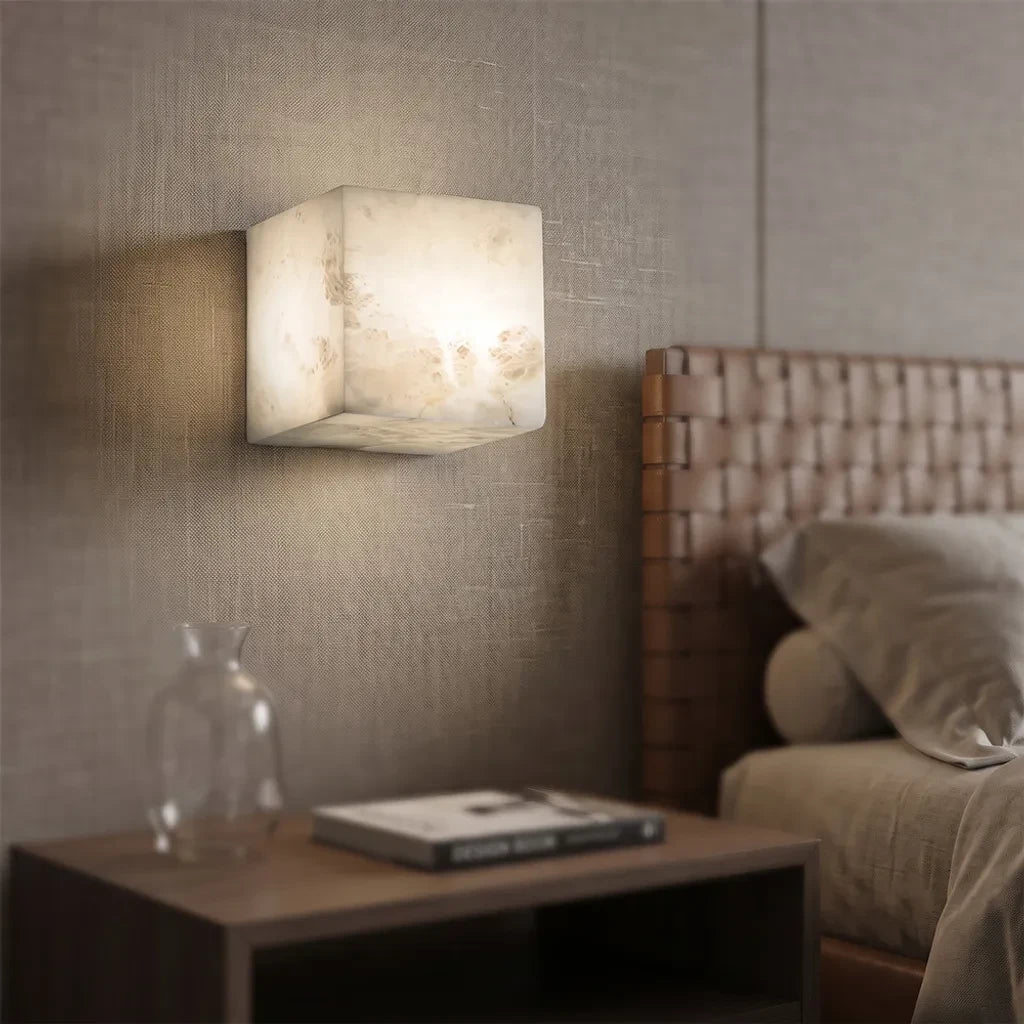 Modern Alabaster Wall Sconce Over Bedroom Nightstand