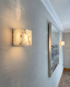 Side View of Modern Alabaster Wall Sconce in Hallway Corridor