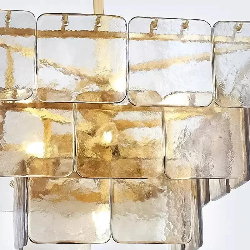 Close Up View of Illuminated Tiered Amber Art Glass Panels and Light Texture
