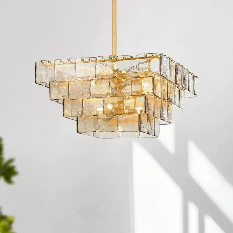 Angled View of Modern Tiered Amber Art Glass Square Chandelier Studio Shot