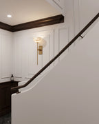 Modern Alabaster Wall Sconce Along Staircase Corridor