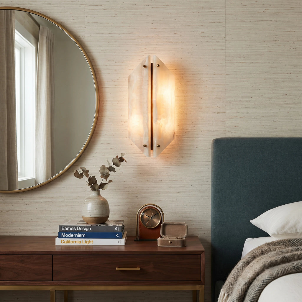 Modern Stone Wall Sconce next to Bedroom Credenza and Round Mirror