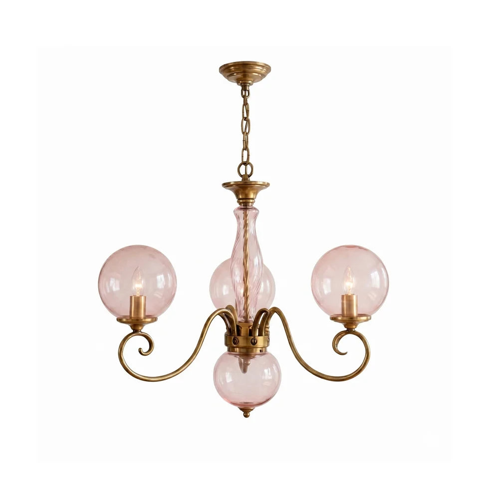 Vintage Brass Chandelier with Pink Glass Globes on White Background