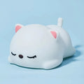 Cute Silicone Sleeping Cat Night Light on Blue Background Studio Display