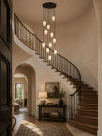 Modern Cascading Alabaster Pendant Lights in Vaulted Entryway Foyer