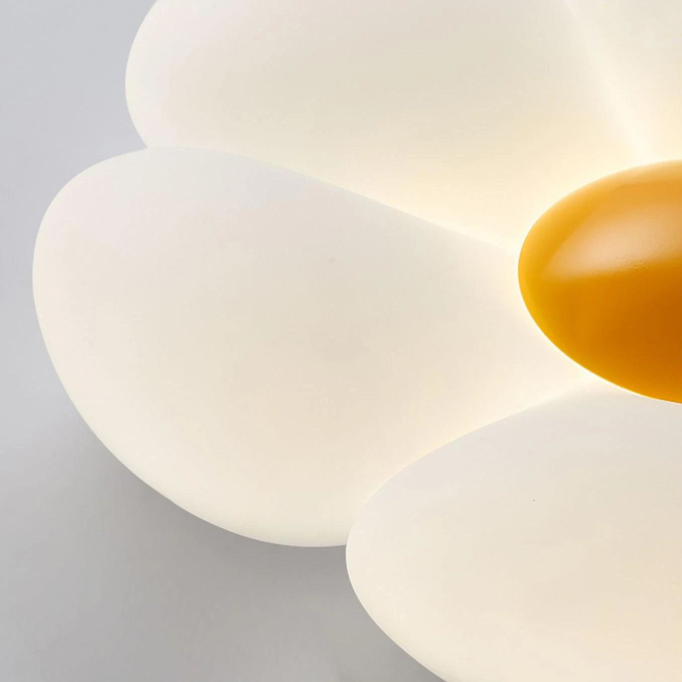 Detail View of Glowing Yellow Flower Petal Lamp Shade