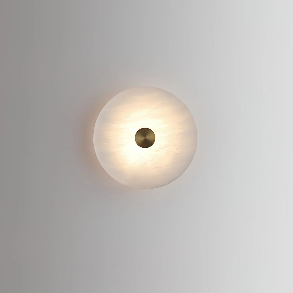 Illuminated Modern Natural Marble Wall Sconce with Brass Knob Studio Display