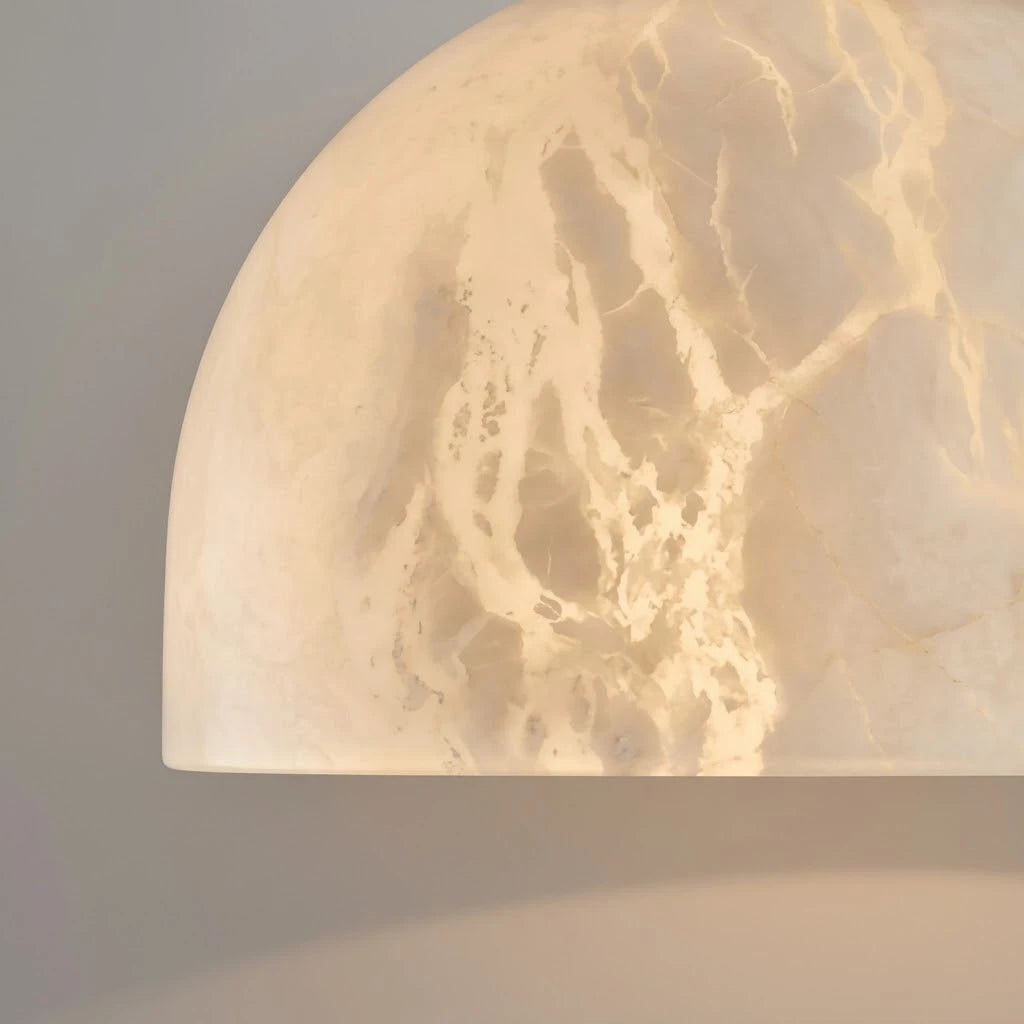 Close Up View of Illuminated Alabaster Dome Shade and Natural Stone Veins