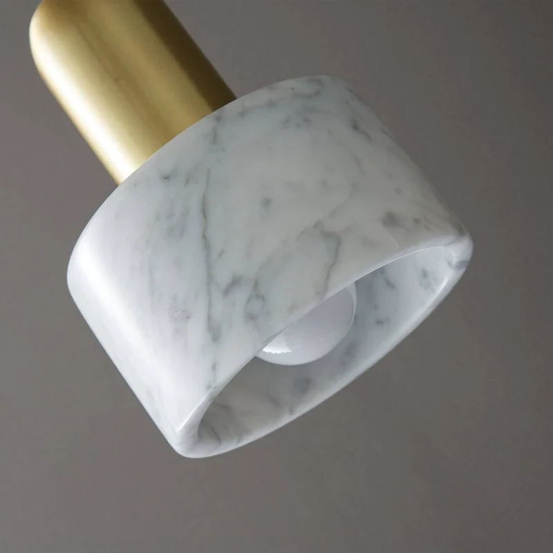 Close Up View of Alabaster Pendant Light Shade and Brass Top