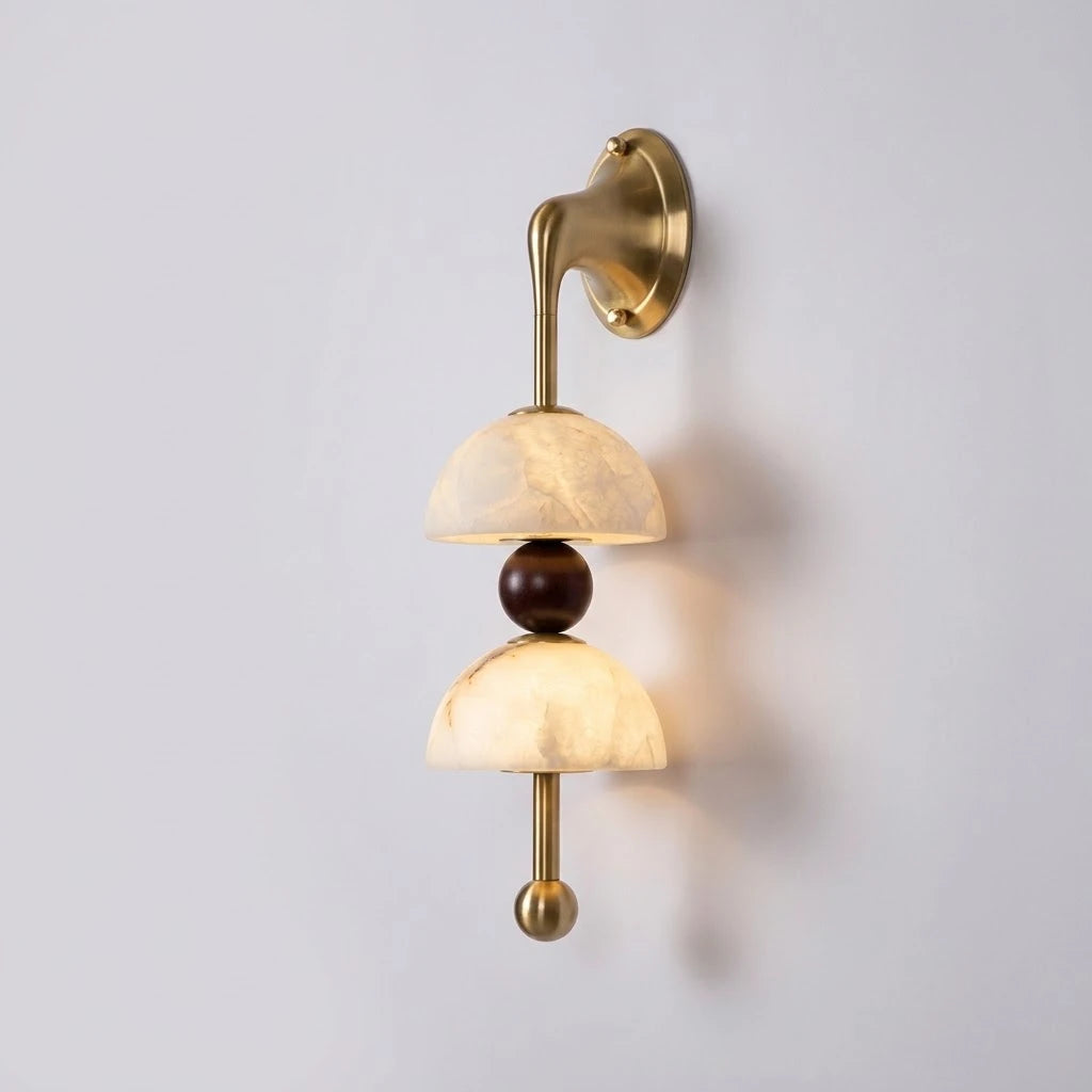 Angled View of Illuminated Modern Dual Alabaster Bowl Wall Sconce