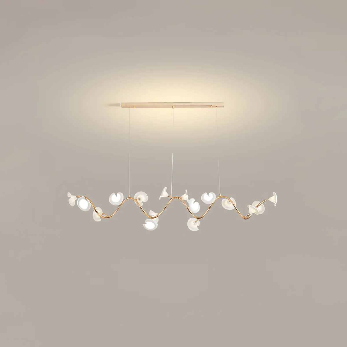 Angled View of Illuminated Modern Gold Floral Linear Chandelier