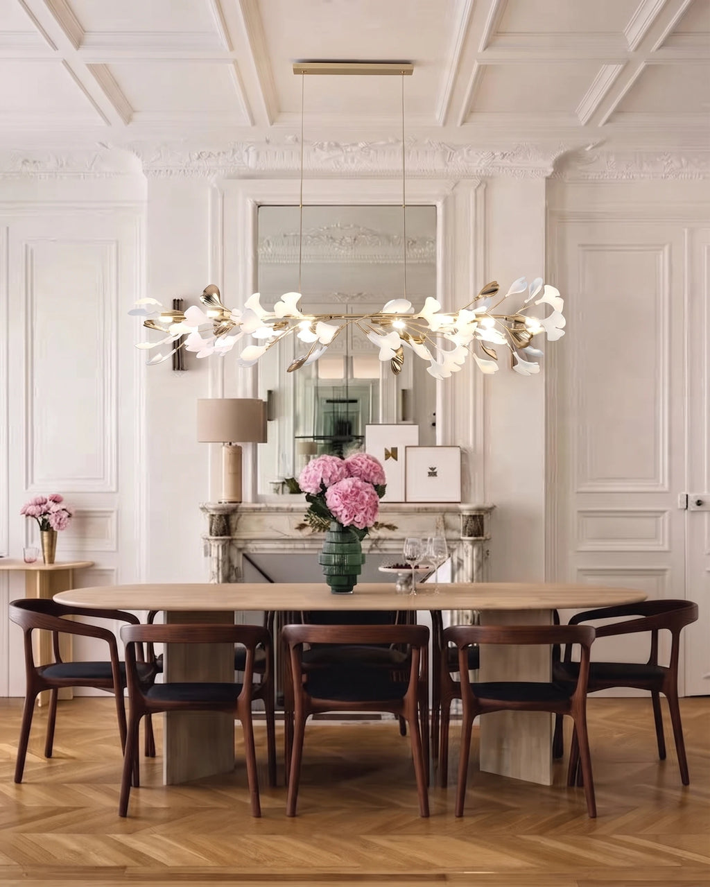 Modern Gold Ginkgo Leaf Linear Chandelier in Elegant Dining Room