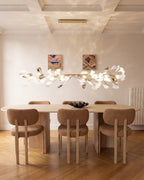 Modern Extended Gold Ginkgo Leaf Chandelier in Modern Dining Room